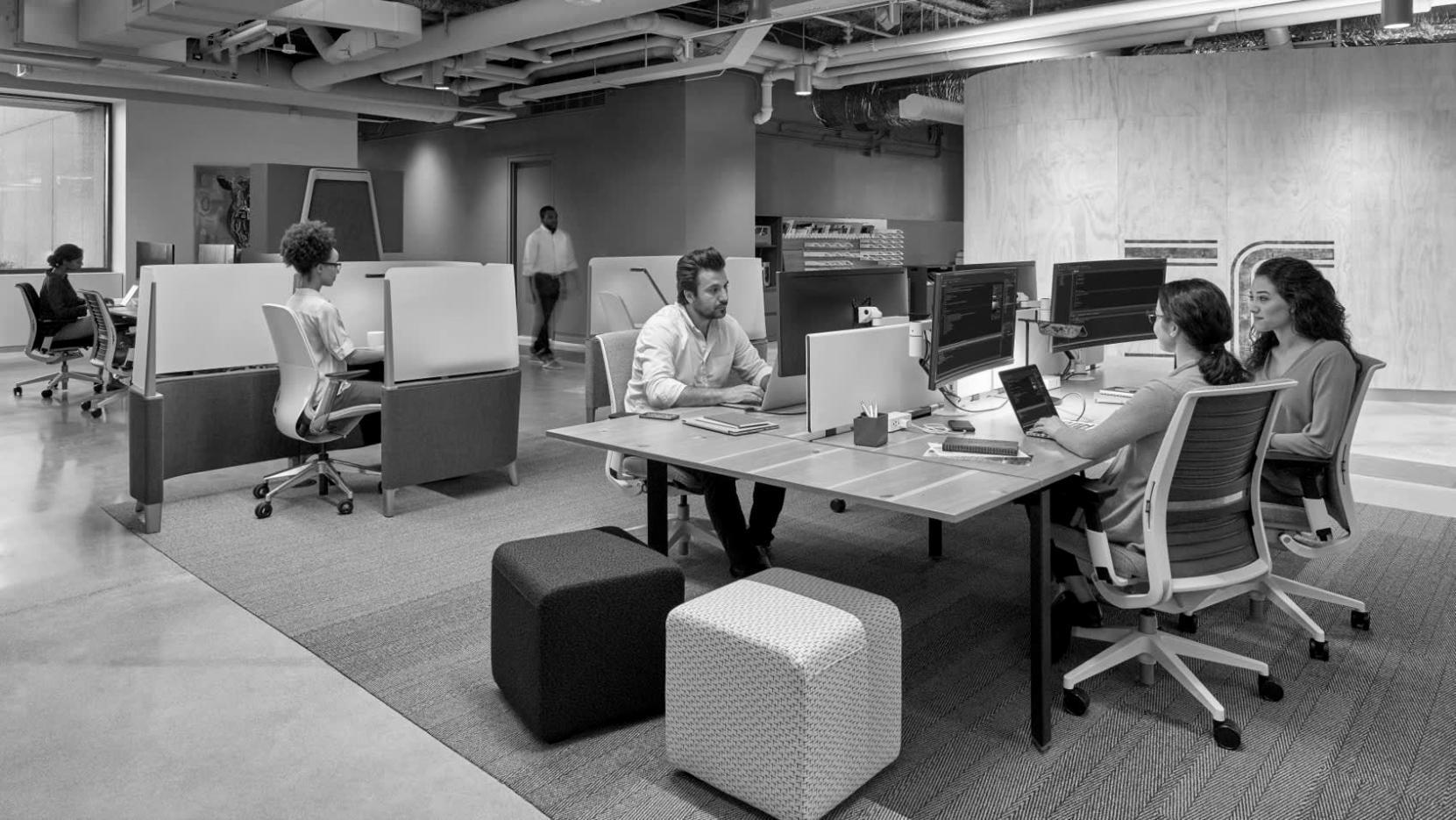 Journalism students collaborating on digital story production